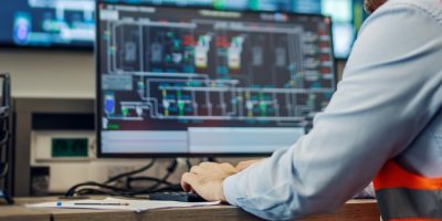 Bridging the Interoperability Gap through Competitive Benchmarking
