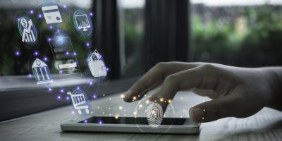 Businessman using smartphone and fingerprint scanning unlock and online banking and icon.Technology Ecommerce Commercial. Online payment digital and shopping on network connection